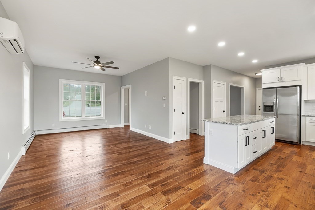 1499 South Athol Road Athol, MA 01331 - Photo 9 of 21 a view of kitchen with stainless steel appliances granite countertop a refrigerator and a stove top oven