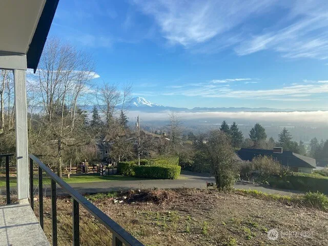 a view of a lake from a balcony