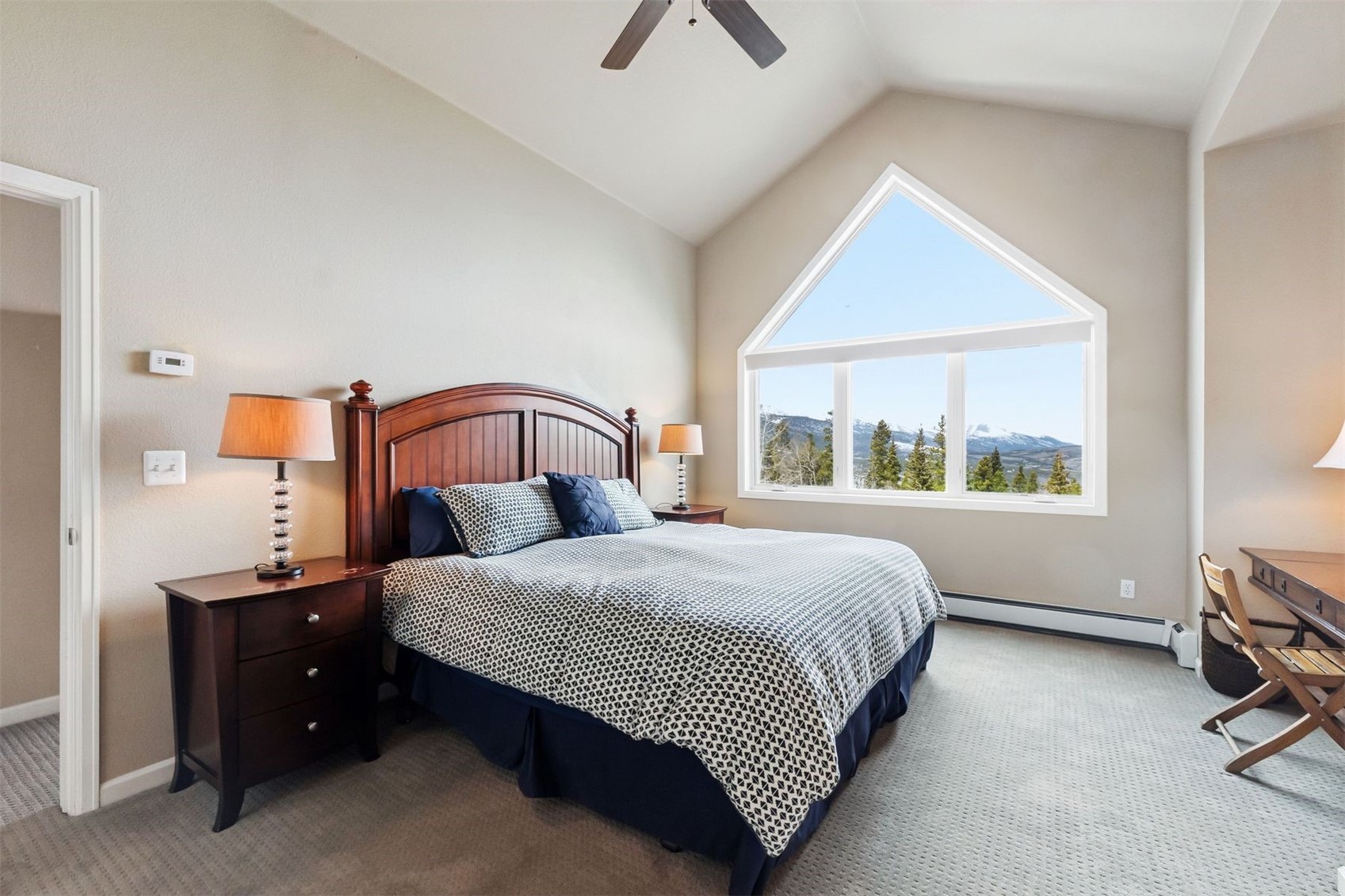 1692 Boreas Pass Road, Unit D Breckenridge, CO 80424 - Photo 14 of 33 Primary bedroom with mountain views