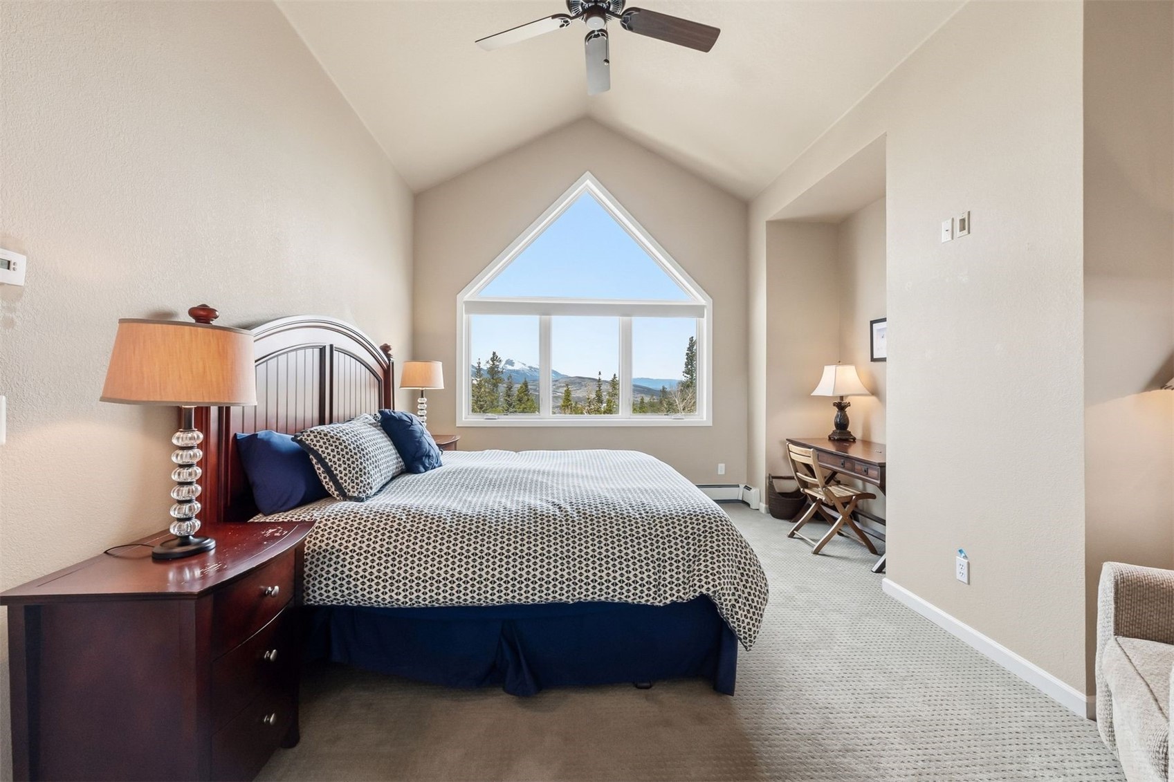 1692 Boreas Pass Road, Unit D Breckenridge, CO 80424 - Photo 15 of 33 Primary bedroom with mountain views