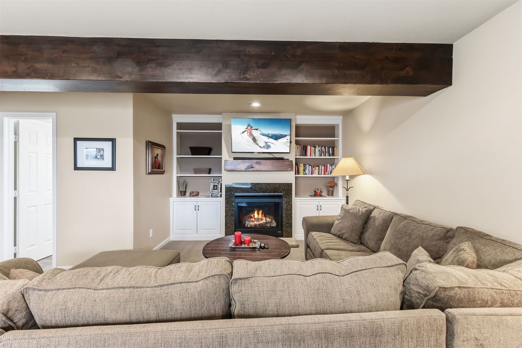 1692 Boreas Pass Road, Unit D Breckenridge, CO 80424 - Photo 24 of 33 Lower lever living room with gas fireplace and full bathroom