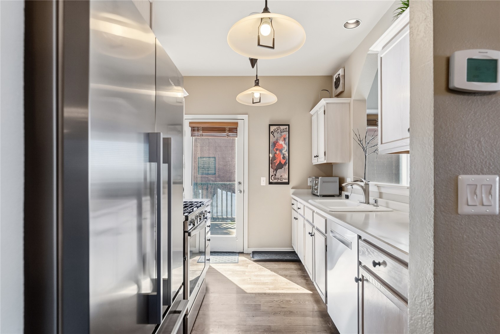 1692 Boreas Pass Road, Unit D Breckenridge, CO 80424 - Photo 10 of 33 Kitchen with access to side deck