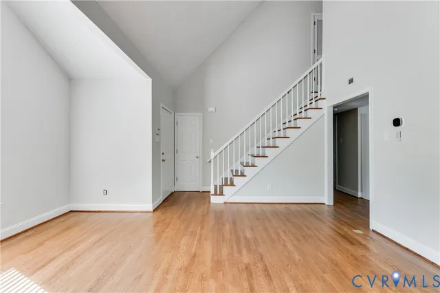 a view of entryway with wooden floor