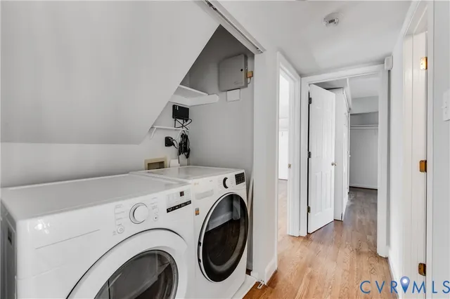 a view of storage and utility room with washer and dryer