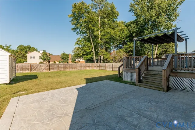 a view of a swimming pool with a patio