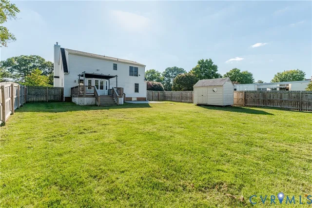 a view of a living room and kitchen