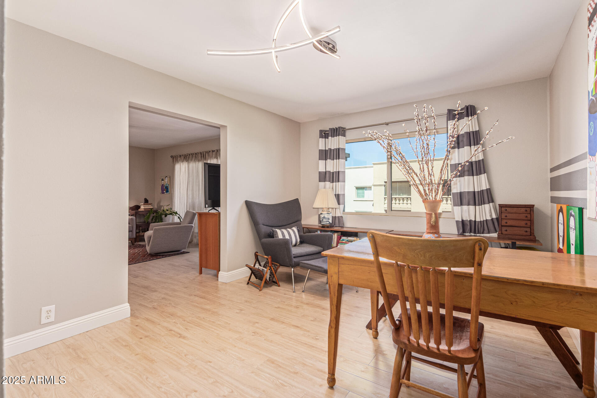 7940 East Camelback Road, Unit 605 Scottsdale, AZ 85251 - Photo 22 of 35 a view of a livingroom with furniture and a window