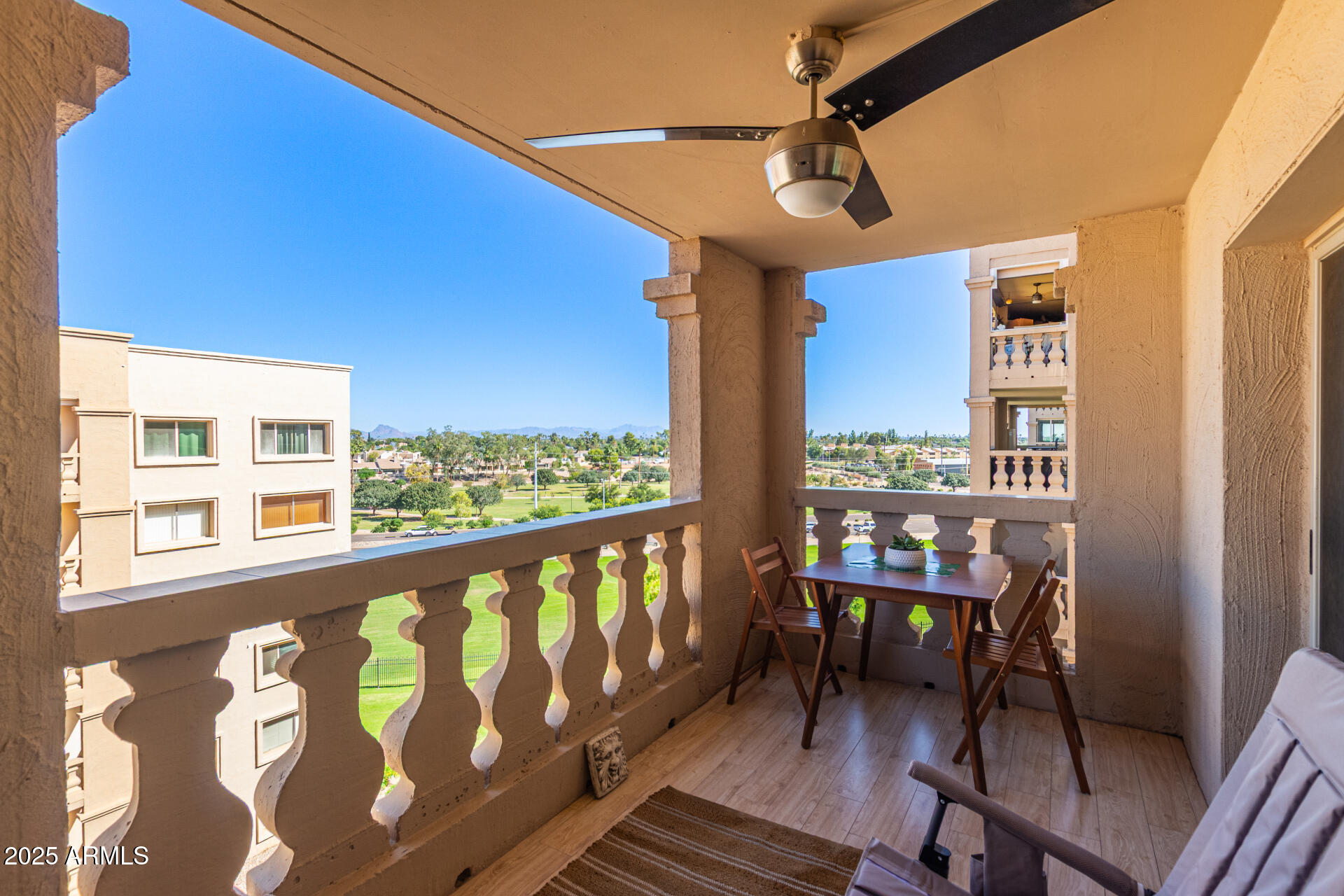 7940 East Camelback Road, Unit 605 Scottsdale, AZ 85251 - Photo 25 of 35 a view of a chairs and table in the balcony