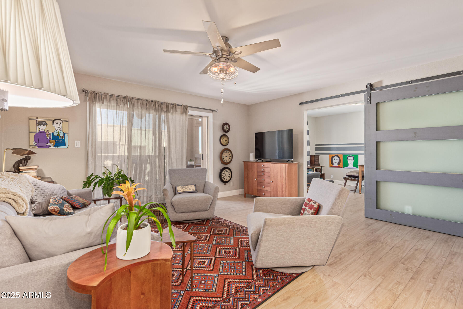 7940 East Camelback Road, Unit 605 Scottsdale, AZ 85251 - Photo 8 of 35 a living room with furniture and a large window