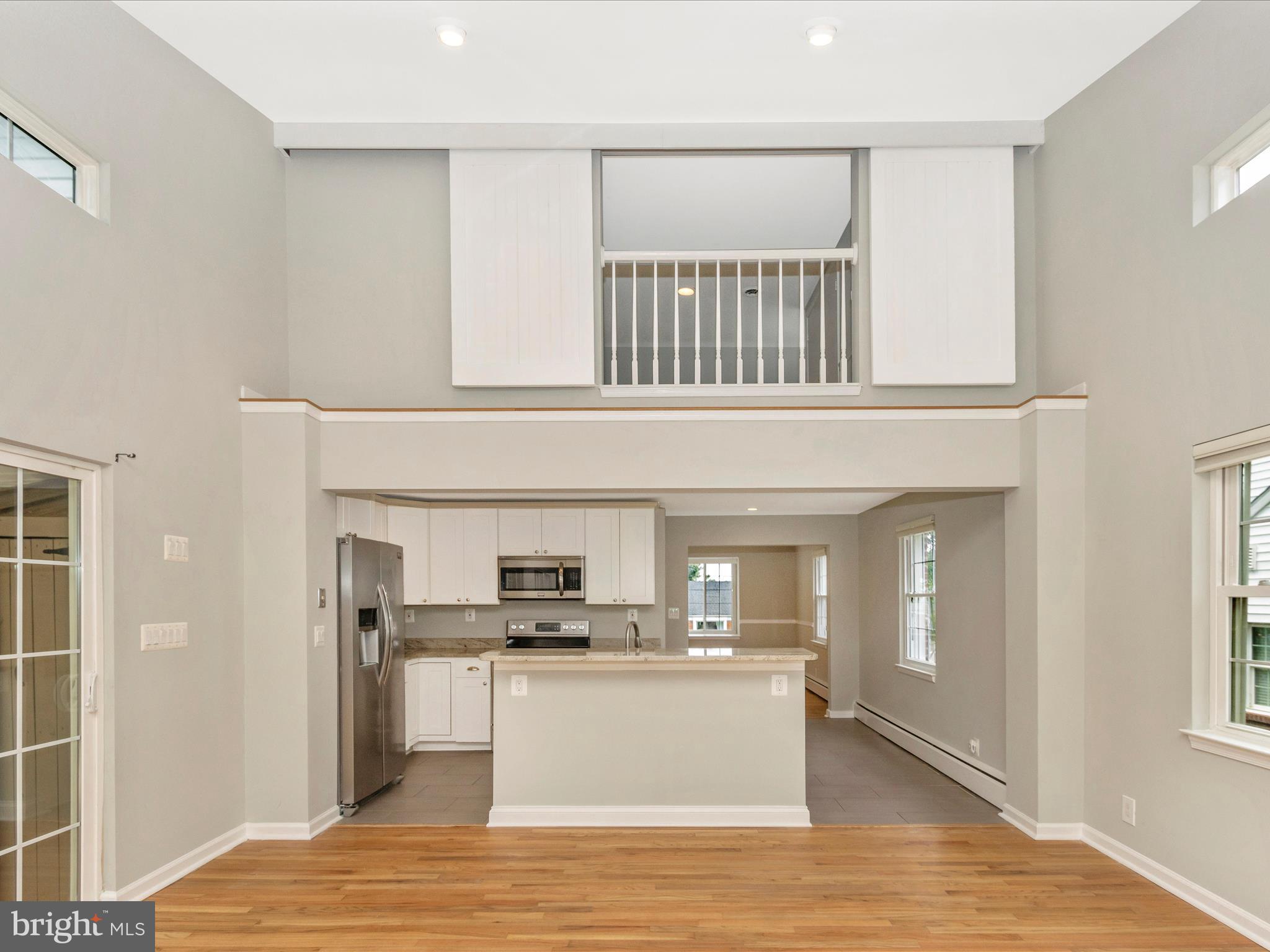 911 Olmstead Road Pikesville, MD 21208 - Photo 20 of 51 Kitchen & upstairs