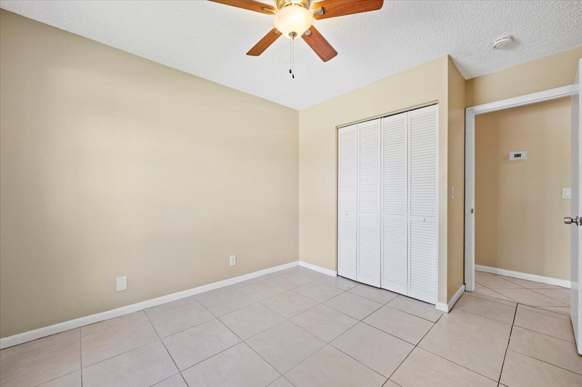 184 Greentree Circle Jupiter, FL 33458 - Photo 12 of 19 Primary Bedroom