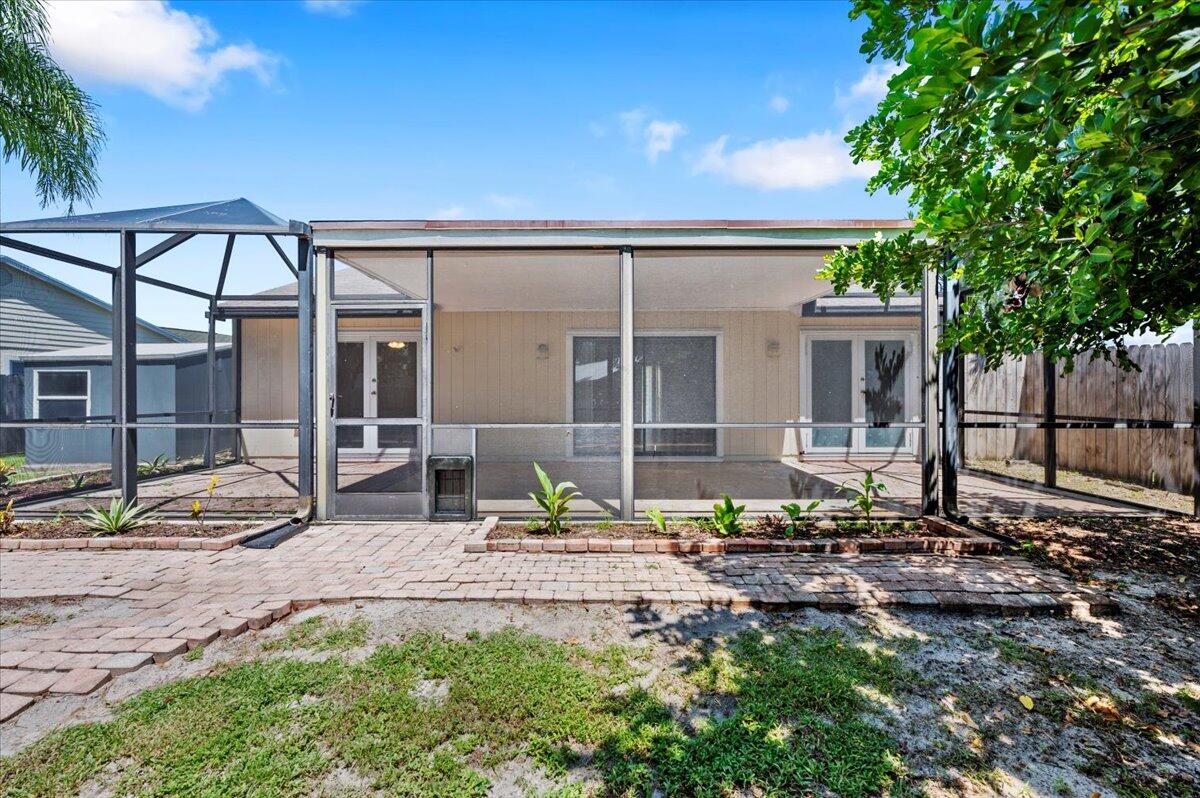 184 Greentree Circle Jupiter, FL 33458 - Photo 18 of 19 Spacious Screened Patio