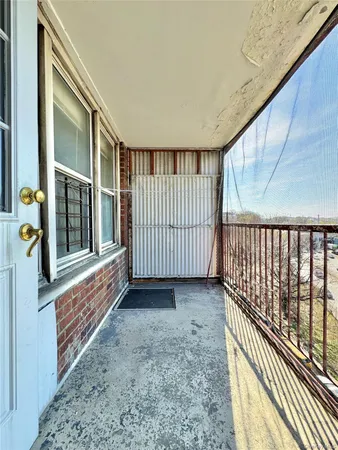 a view of a porch with a door