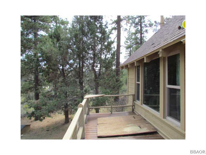 21 Holcomb Valley Road Big Bear Lake, CA 92315 - Photo 16 of 25 a view of backyard with green space