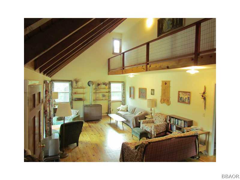 21 Holcomb Valley Road Big Bear Lake, CA 92315 - Photo 4 of 25 a living room with furniture