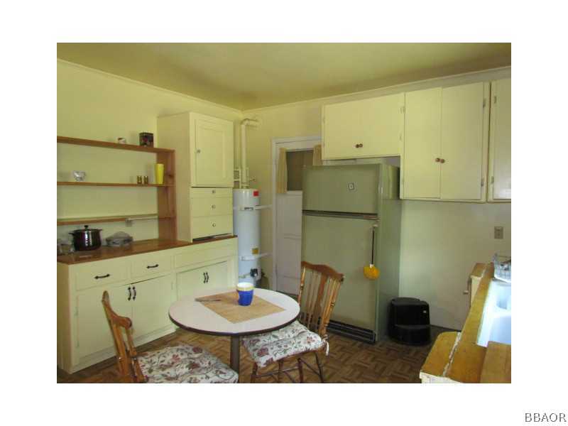 21 Holcomb Valley Road Big Bear Lake, CA 92315 - Photo 7 of 25 a bathroom with a sink and a mirror
