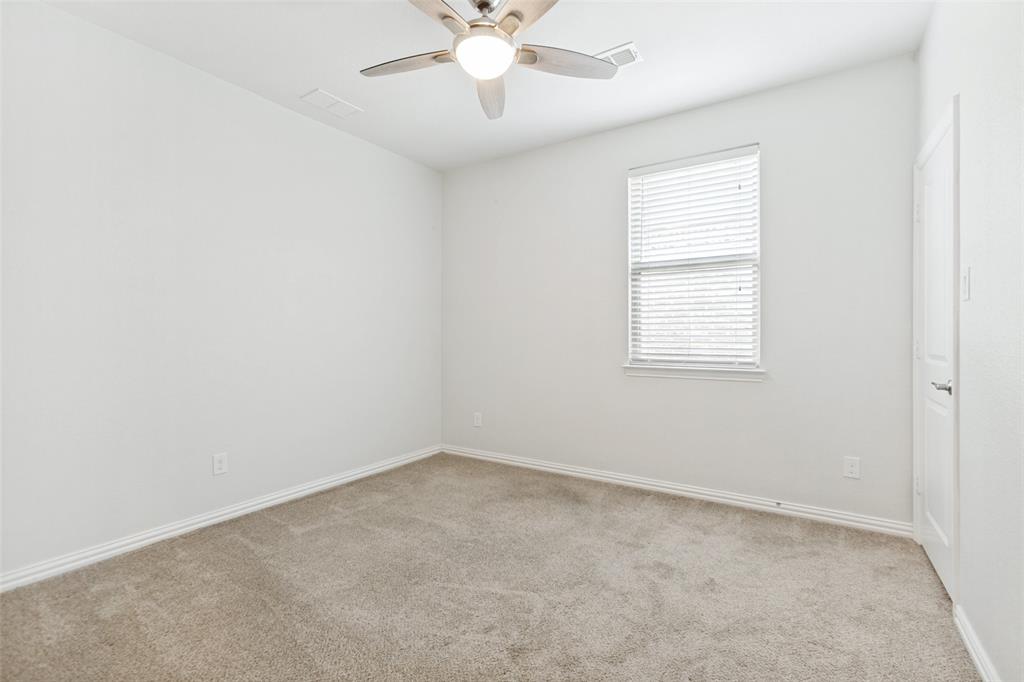 605 Ansley Way Allen, TX 75013 - Photo 23 of 28 Bright interior space featuring neutral carpeting and white wall paint