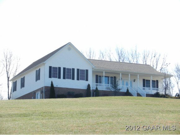 1482 Roman Road Mount Sidney, VA 24467 - Photo 1 of 8 a front view of a house with a yard