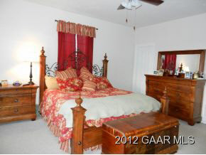 1482 Roman Road Mount Sidney, VA 24467 - Photo 6 of 8 a bed room with a bed and a dresser