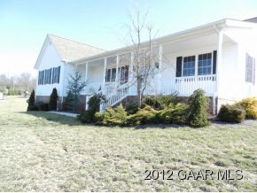1482 Roman Road Mount Sidney, VA 24467 - Photo 8 of 8 a view of a house with backyard and sitting area