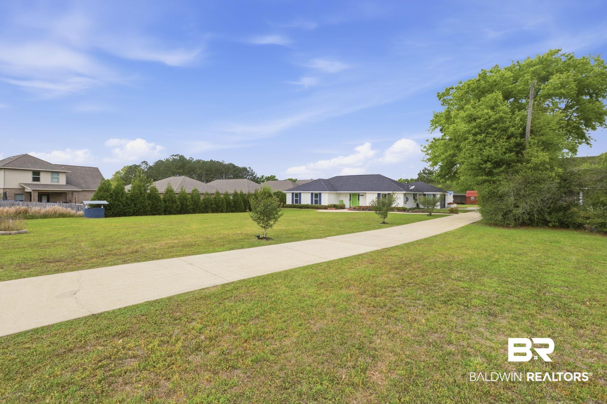 10670 Jeff Hamilton Road Mobile, AL 36695 - Photo 14 of 43 View of front of property featuring a front lawn