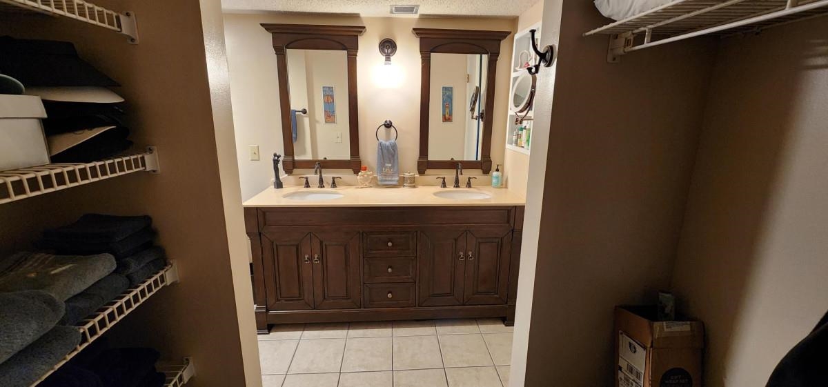 2 Dondanville Road, Unit 216 St. Augustine, FL 32080 - Photo 16 of 23 a bathroom with a sink and a mirror