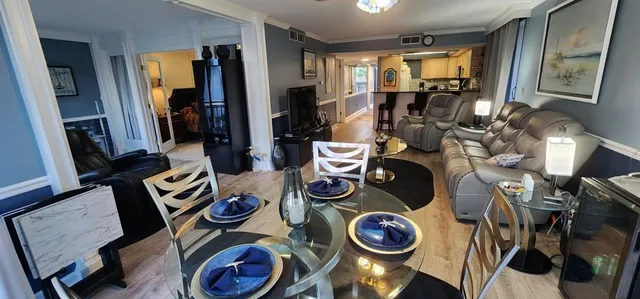 a view of livingroom with furniture and wooden floor
