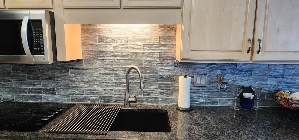 2 Dondanville Road, Unit 216 St. Augustine, FL 32080 - Photo 8 of 23 a kitchen with a sink and a window