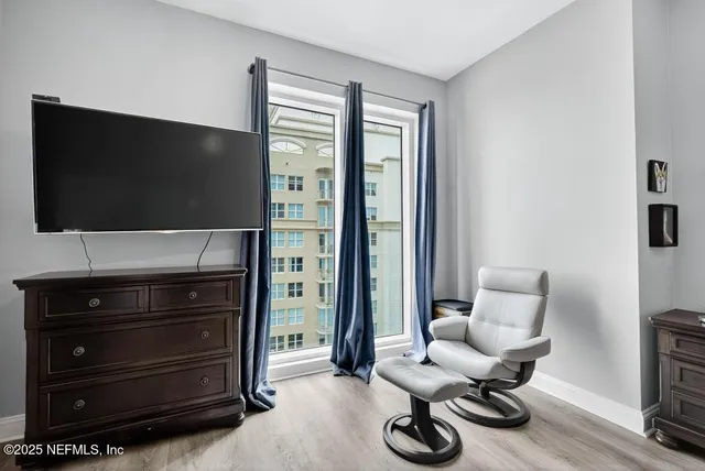 a bathroom with a double vanity sink mirror and shower