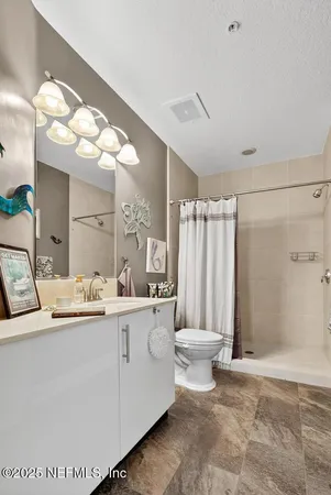 a view of a porch with furniture and garden