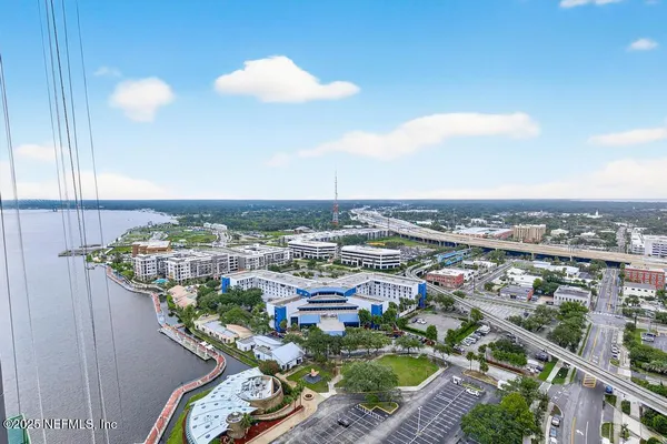 a view of a garden with lawn chairs