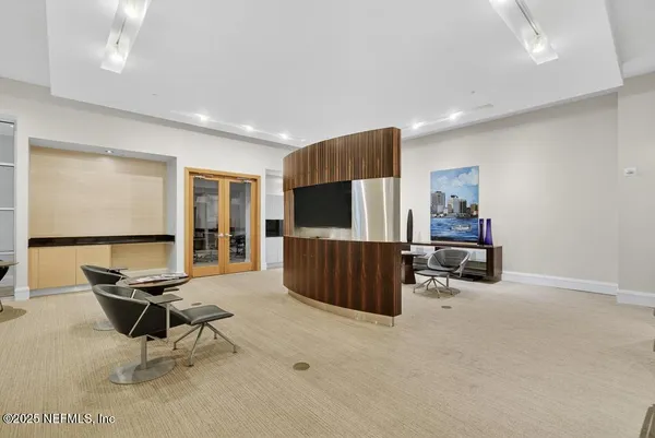 a view of a dining room with furniture