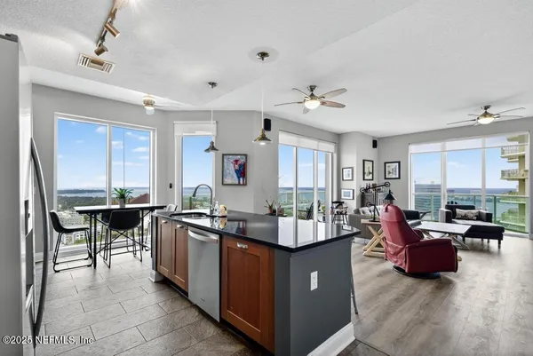 a view of a dining room with furniture