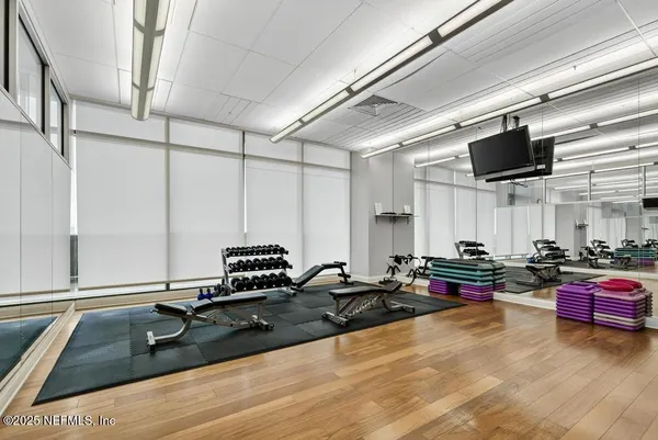 a kitchen with counter top space a sink and appliances