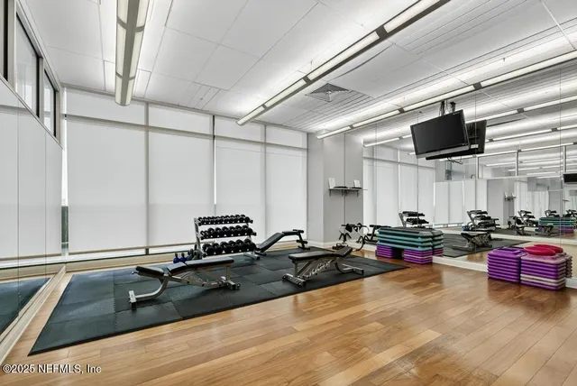 a kitchen with counter top space a sink and appliances