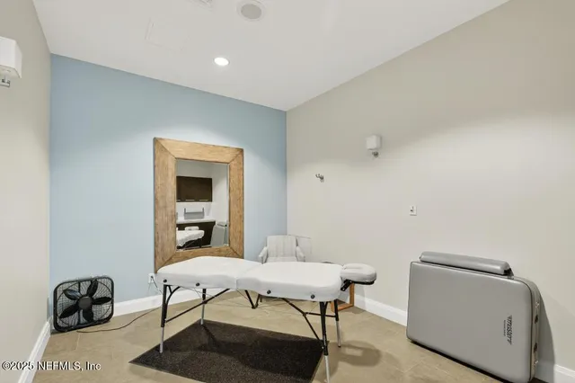 a view of roof with city view