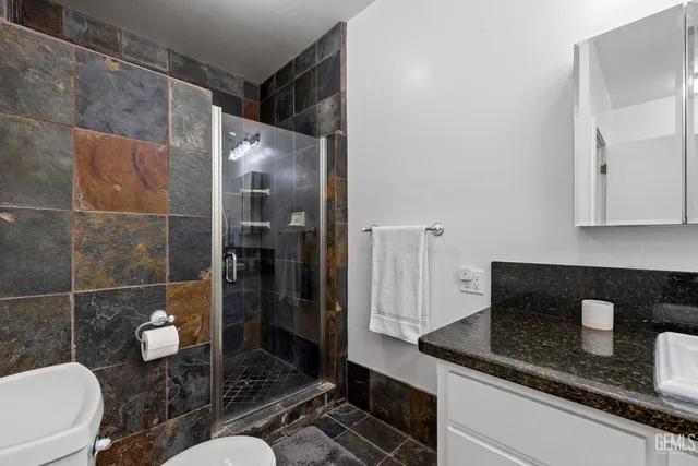 a bathroom with a sink a toilet and a bathtub