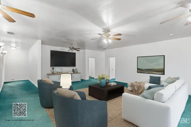 a view of a dining room with furniture wooden floor and a chandelier