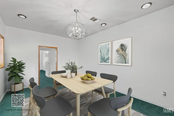 a view of a fire pit with wooden fence