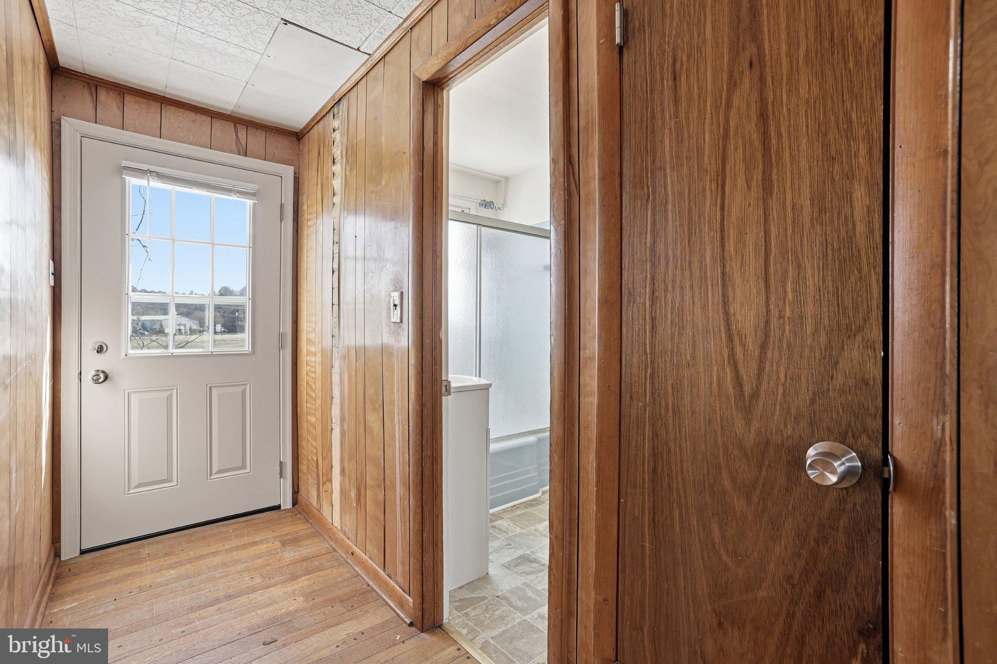 20287 Ridge Road Colonial Beach, VA 22443 - Photo 5 of 21 Inviting entryway with warm wood tones.
