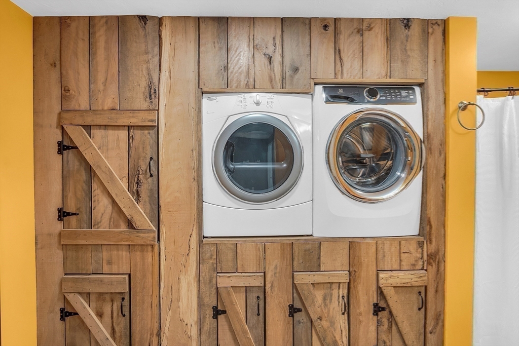 59 Molasses Hill Road Brookfield, MA 01506 - Photo 23 of 42 a view of a hallway with washer and dryer