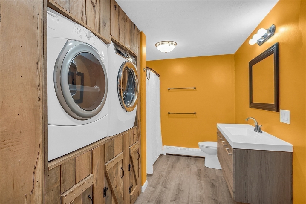 59 Molasses Hill Road Brookfield, MA 01506 - Photo 24 of 42 a view of a hallway with washer and dryer