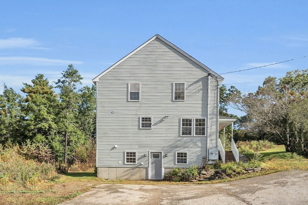 59 Molasses Hill Road Brookfield, MA 01506 - Photo 35 of 42 a view of a house with a yard