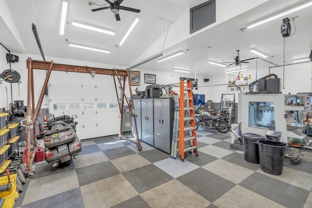 59 Molasses Hill Road Brookfield, MA 01506 - Photo 36 of 42 a view of a room with lots of gym equipment