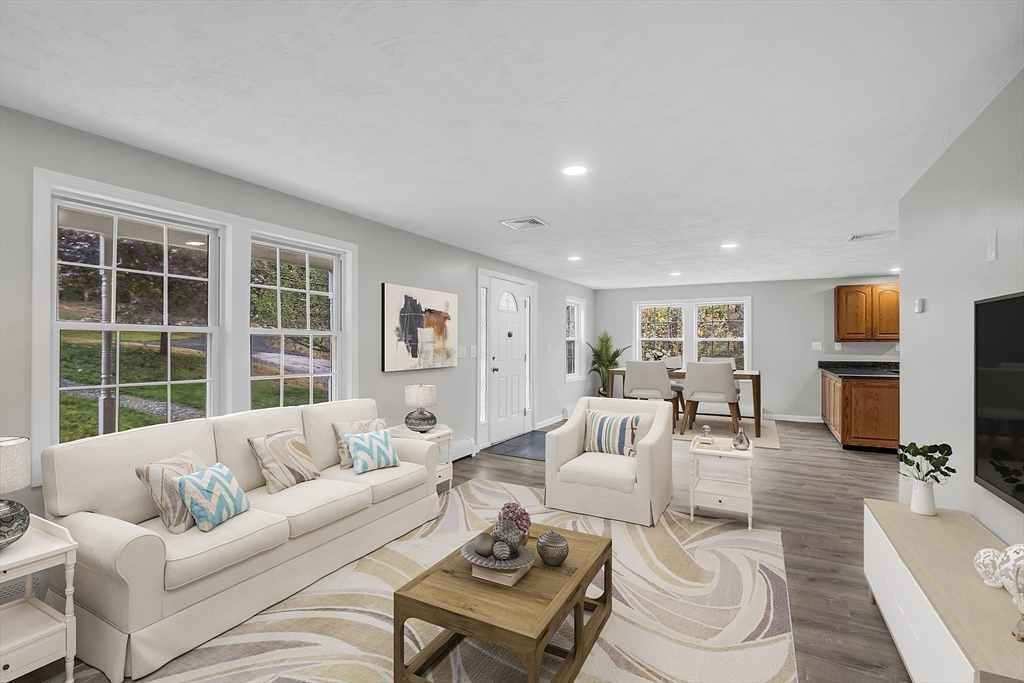 59 Molasses Hill Road Brookfield, MA 01506 - Photo 6 of 42 a living room with furniture and a large window