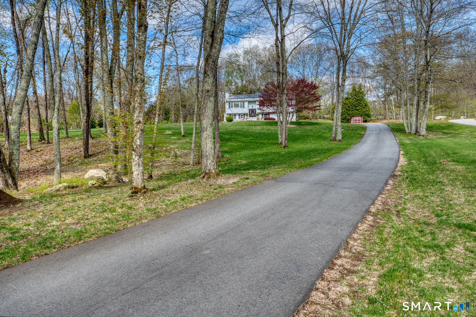 Welcome to 11 Hally Lane...brand new driveway leads to level parking area and oversized 2 car garage.