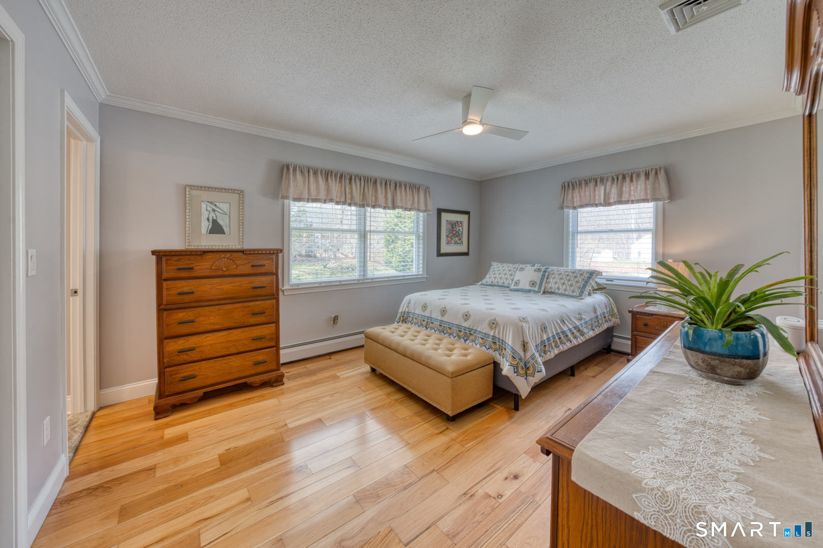 11 Hally Lane Colchester, CT 06415 - Photo 17 of 36 Master bedroom has gleaming hard wood floors, tons of natural light and plenty of room for all your furniture. Tons of closet space too!