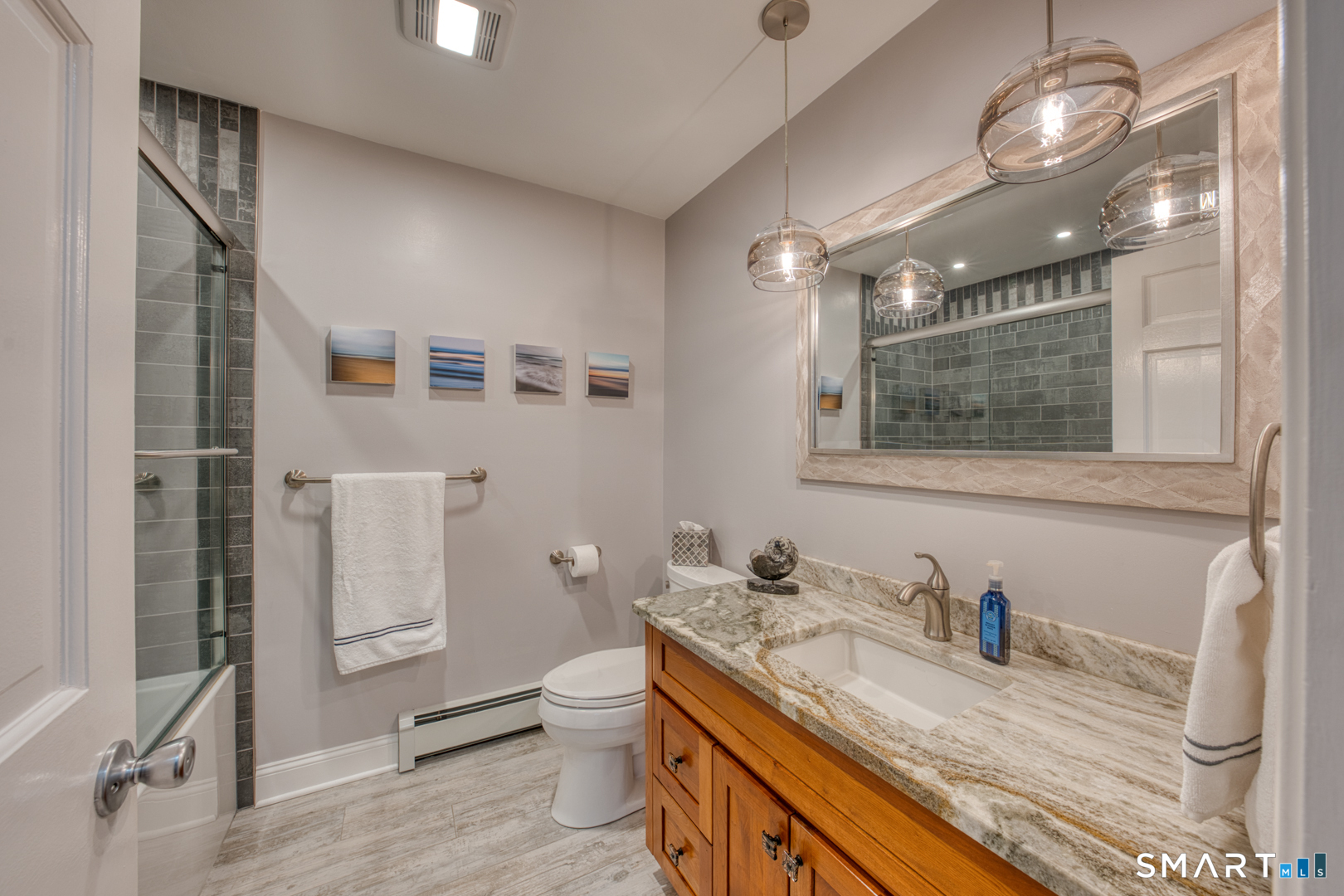 11 Hally Lane Colchester, CT 06415 - Photo 27 of 36 Full Bath in main hallway was recently renovated and all fixtures and mirror were purchased at CT lightening in Hartford. All top of the line items added throughout this home...