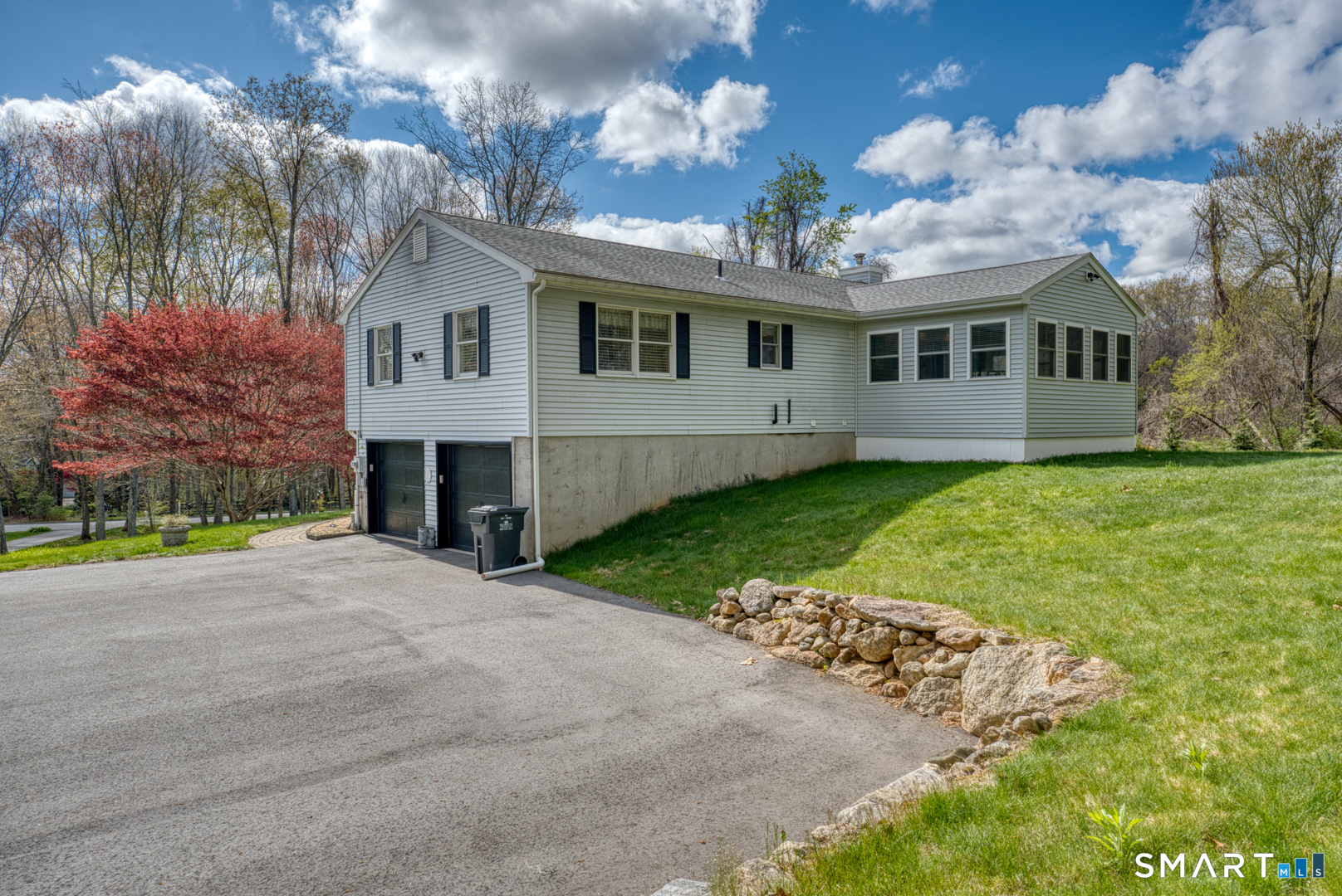 11 Hally Lane Colchester, CT 06415 - Photo 34 of 36 Such a pretty view of the side yard and new driveway and new garage doors...