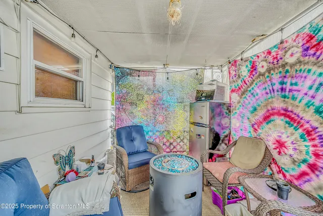 a very nice looking room with a flower pot